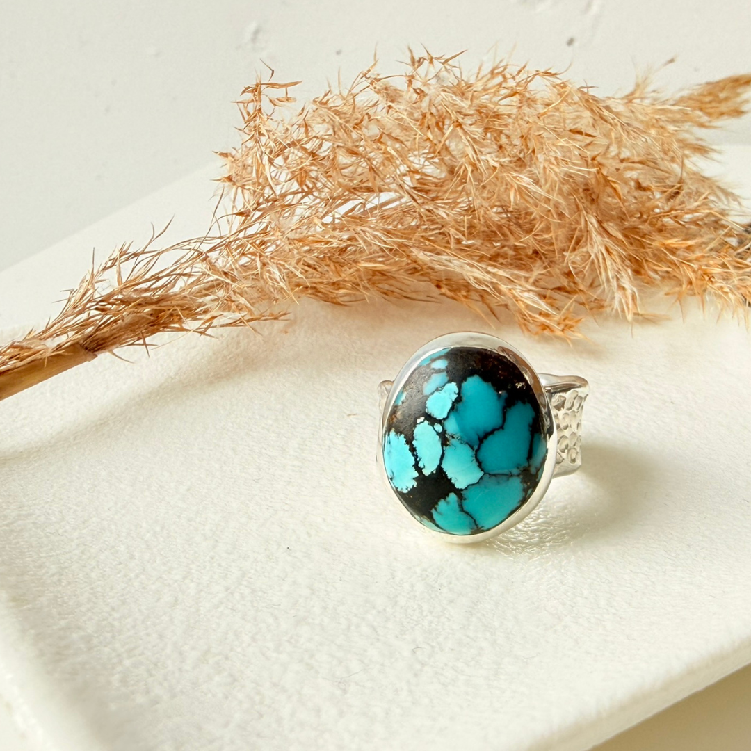 Bague en argent massif avec une turquoise de Hubei