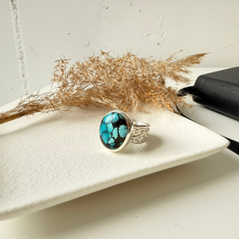 Bague en argent massif avec une turquoise de Hubei