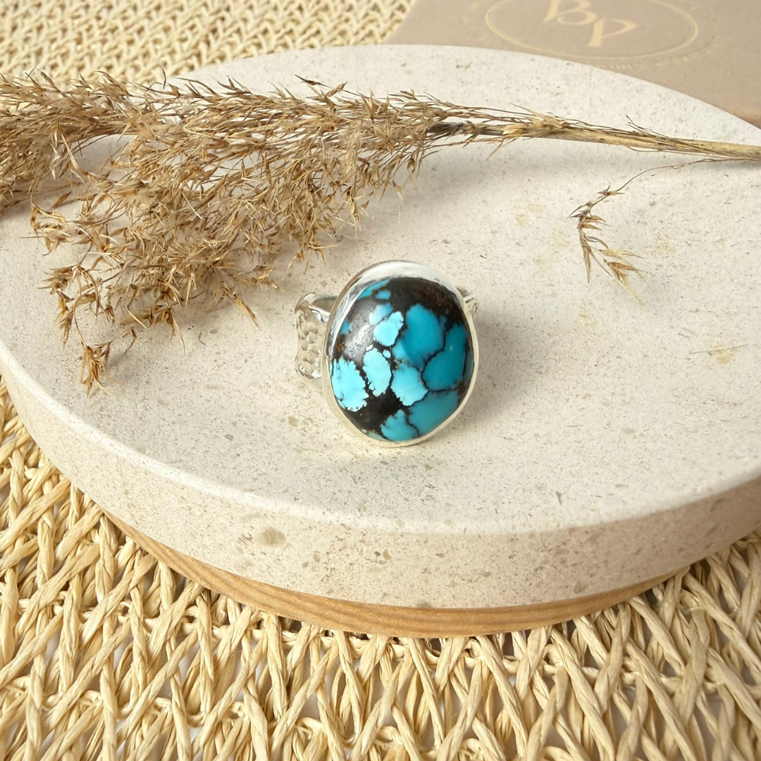 Bague en argent massif avec une turquoise de Hubei